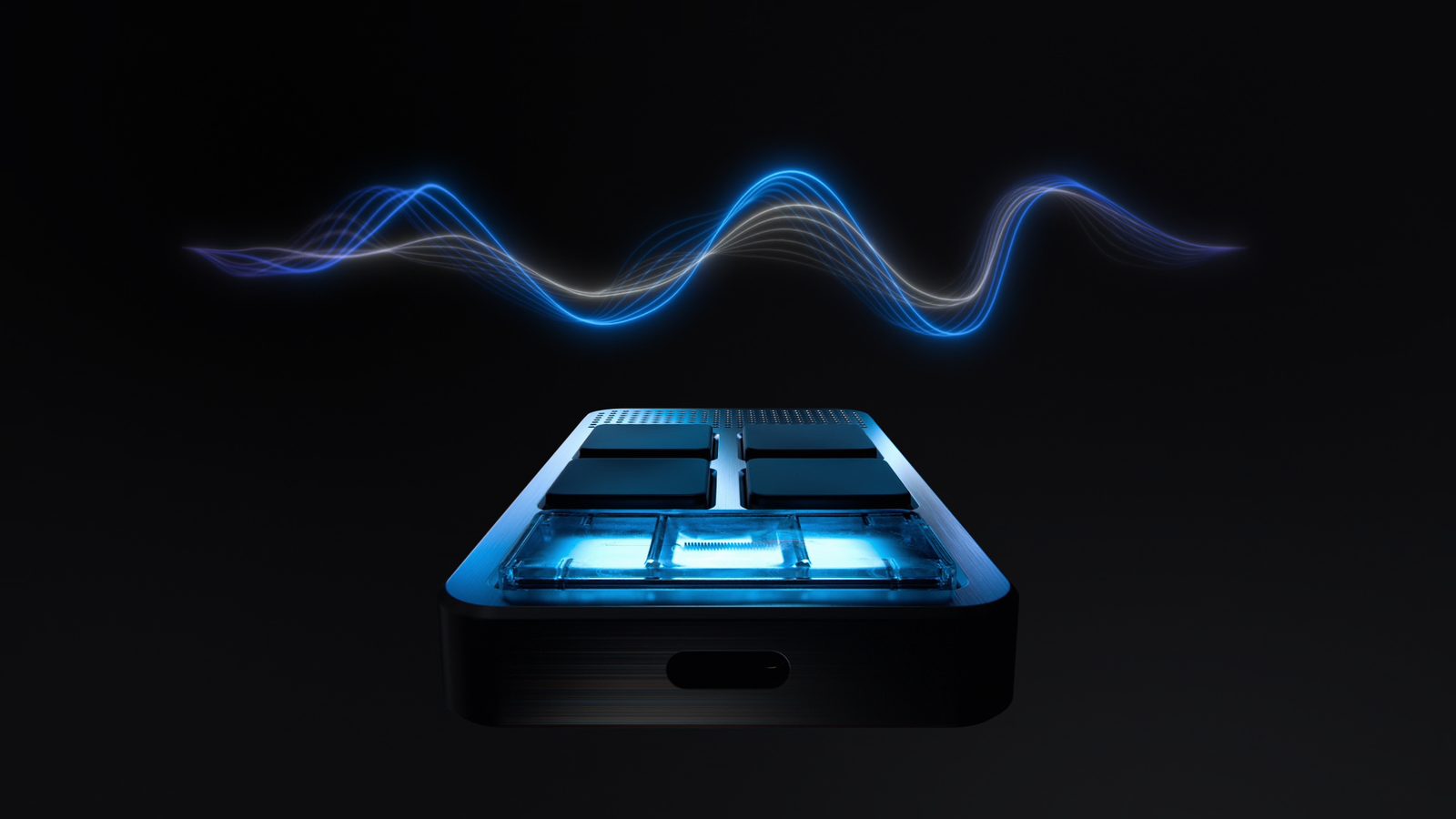 VoicePad keys lit blue under a sound wave