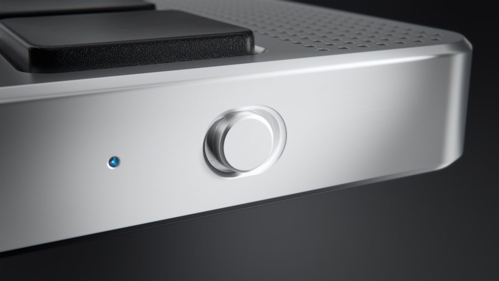 Close-up of the aluminum edge, the slide switch and the status light